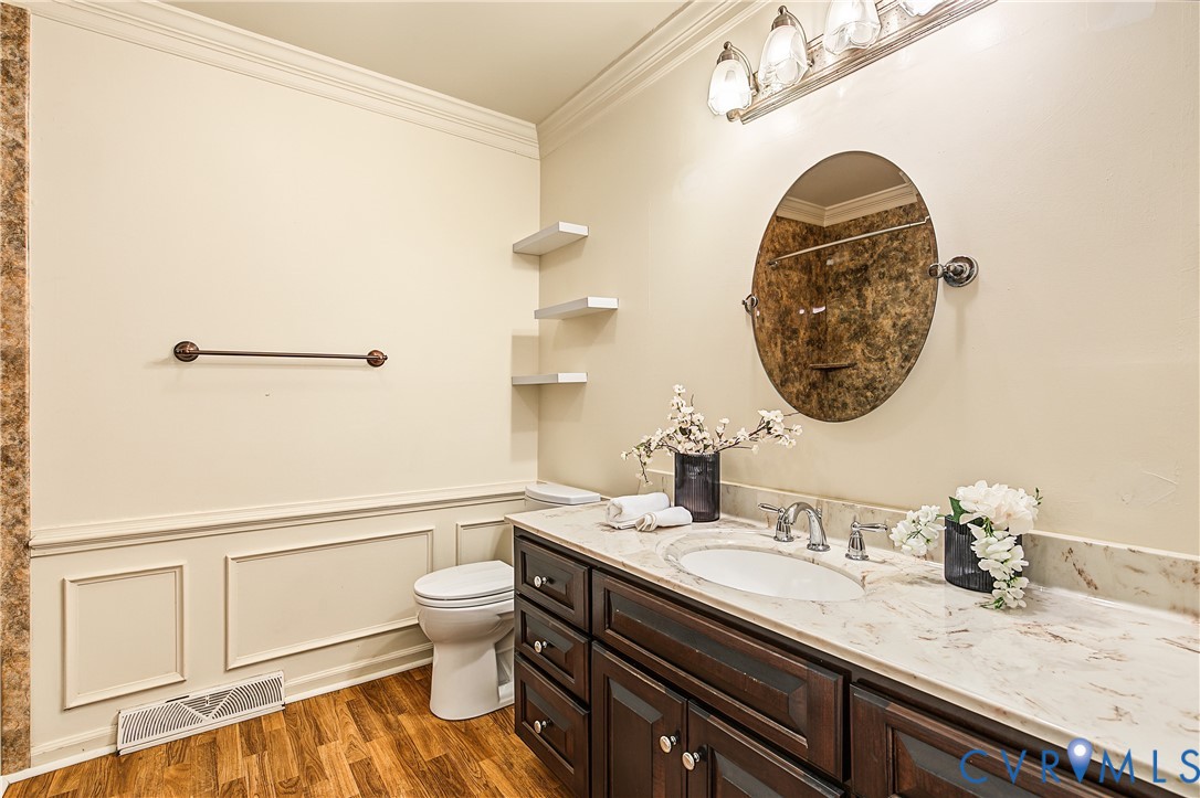 13310 Gladehill Road Chester, VA 23831 - Photo 18 of 41 Dark wood-finish vanity with an undermount sink, l