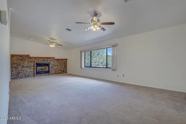 a kitchen with granite countertop cabinets and steel stainless steel appliances