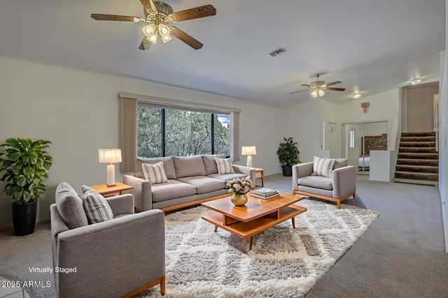 a kitchen with a sink cabinets and window
