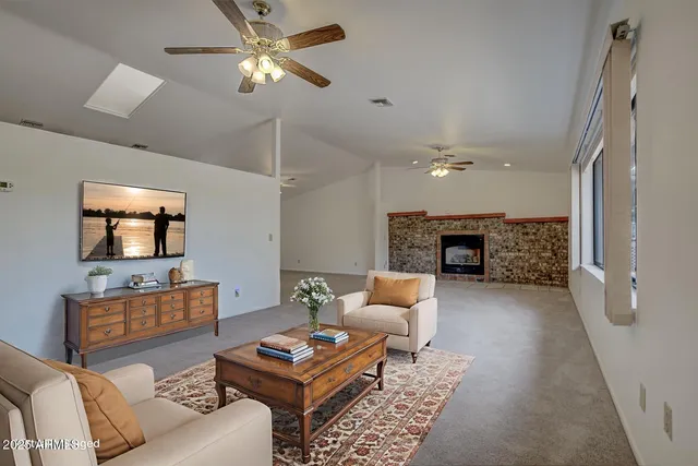 a view of cabinets a sink and dishwasher in white cabinet