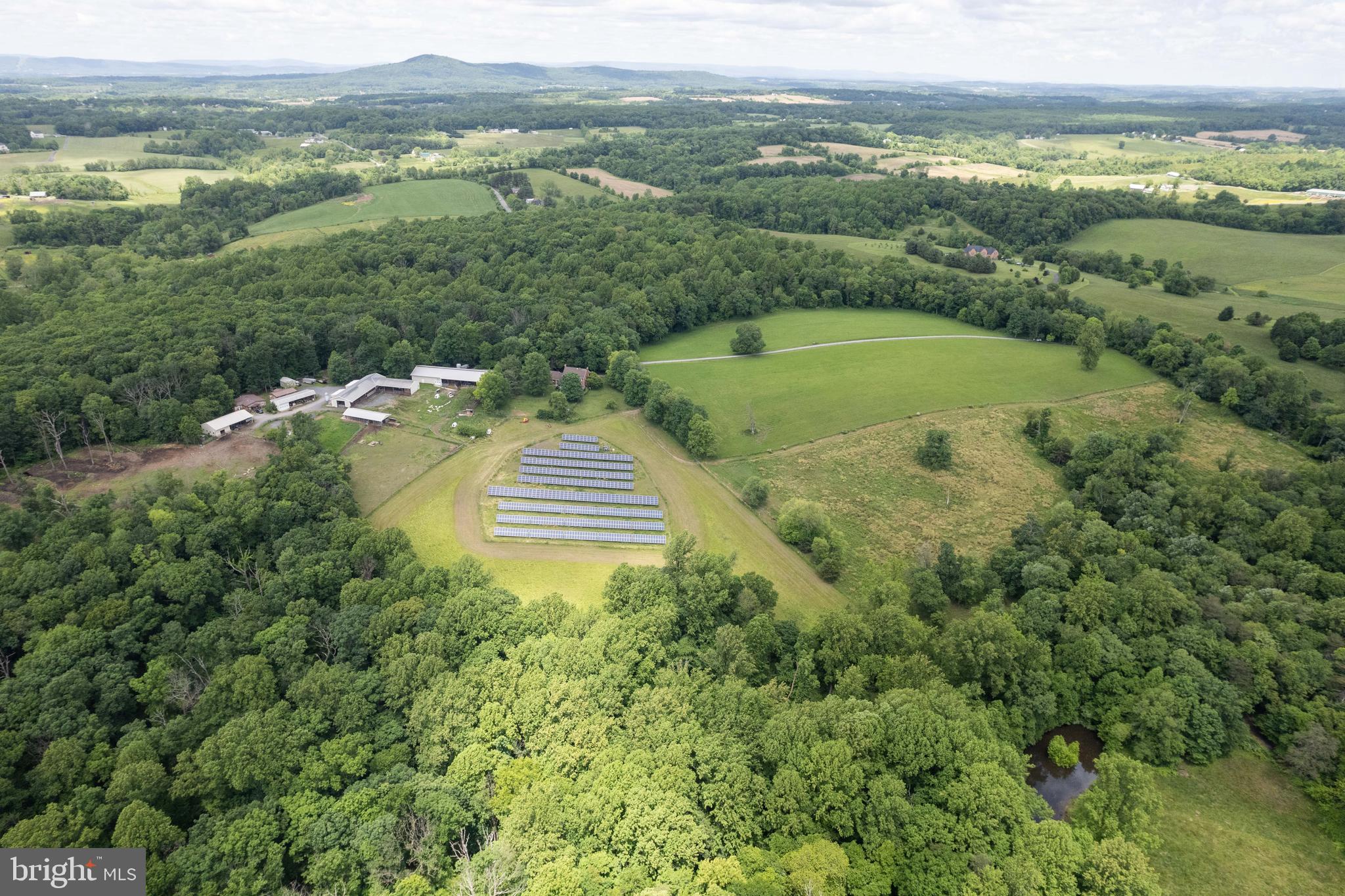 16120 Barnesville Road Boyds, MD 20841 - Photo 112 of 128 a view of a city with lush green forest