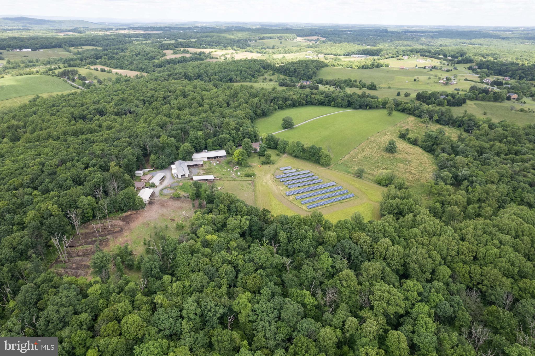 16120 Barnesville Road Boyds, MD 20841 - Photo 113 of 128 an aerial view of a residential houses with outdoor space and trees all around