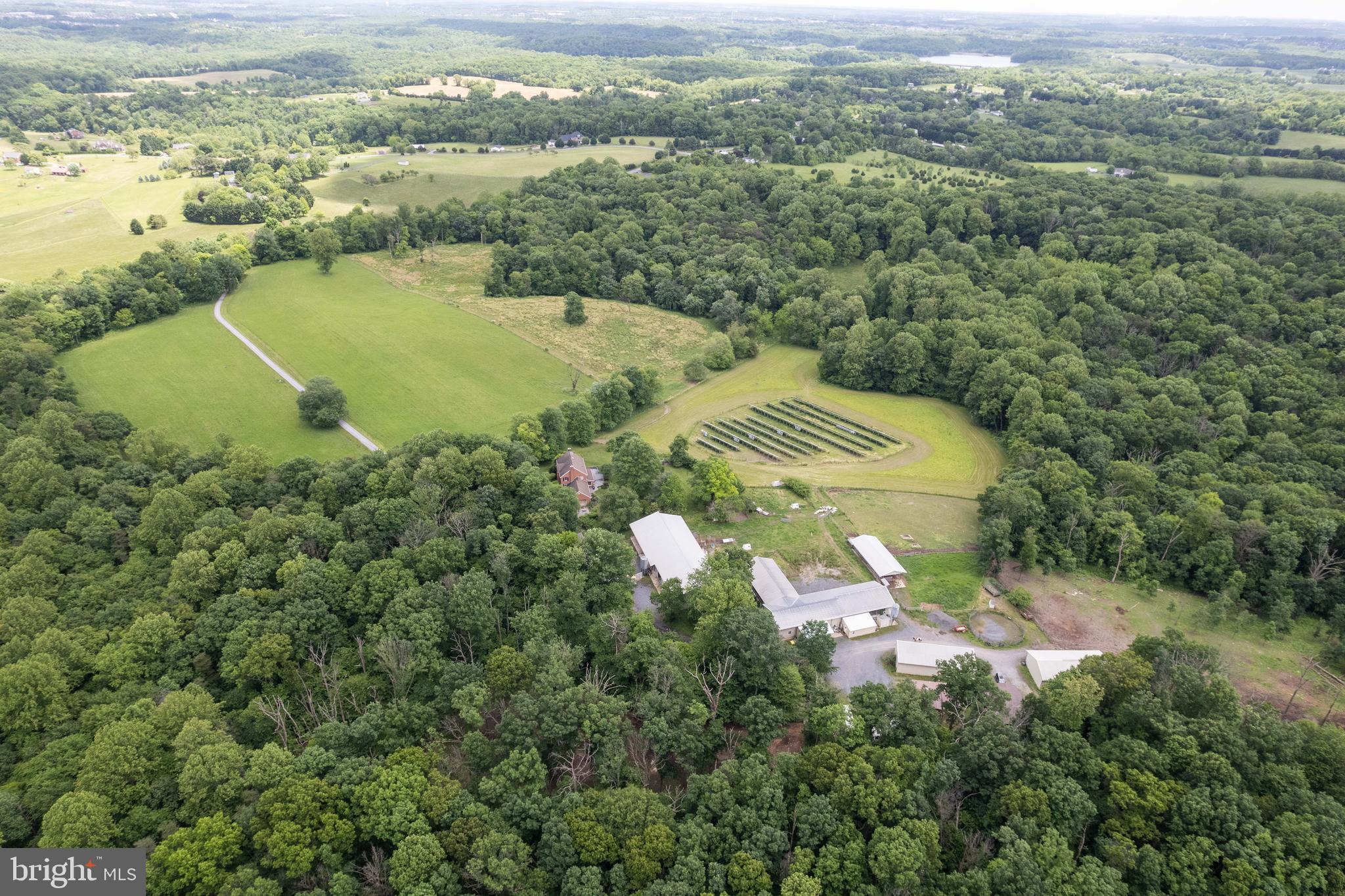 16120 Barnesville Road Boyds, MD 20841 - Photo 118 of 128 an aerial view of a residential houses with outdoor space and trees all around