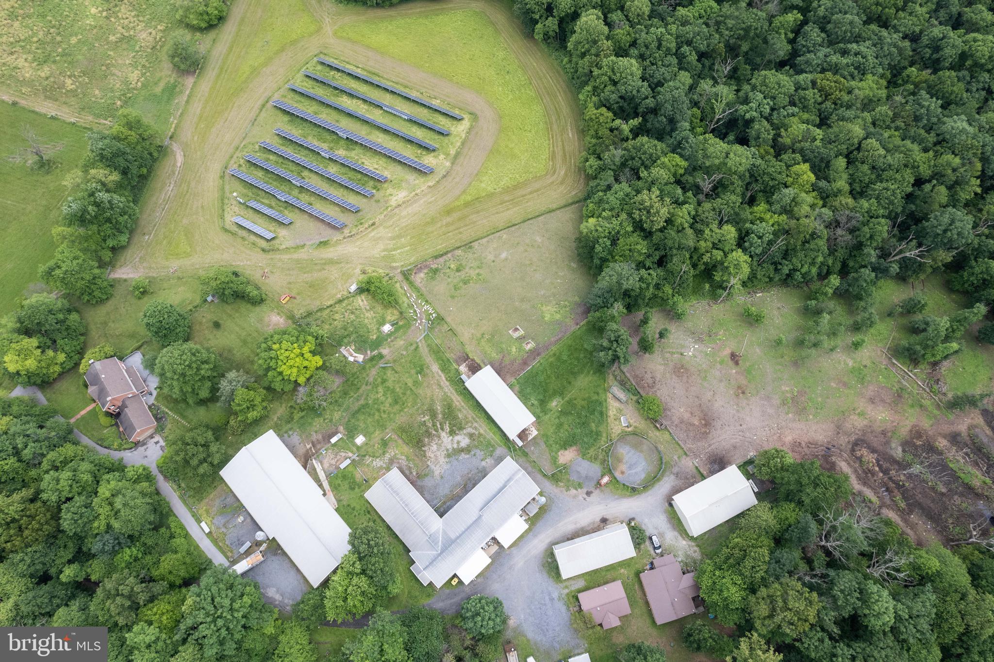 16120 Barnesville Road Boyds, MD 20841 - Photo 119 of 128 an aerial view of a house with garden space and street view