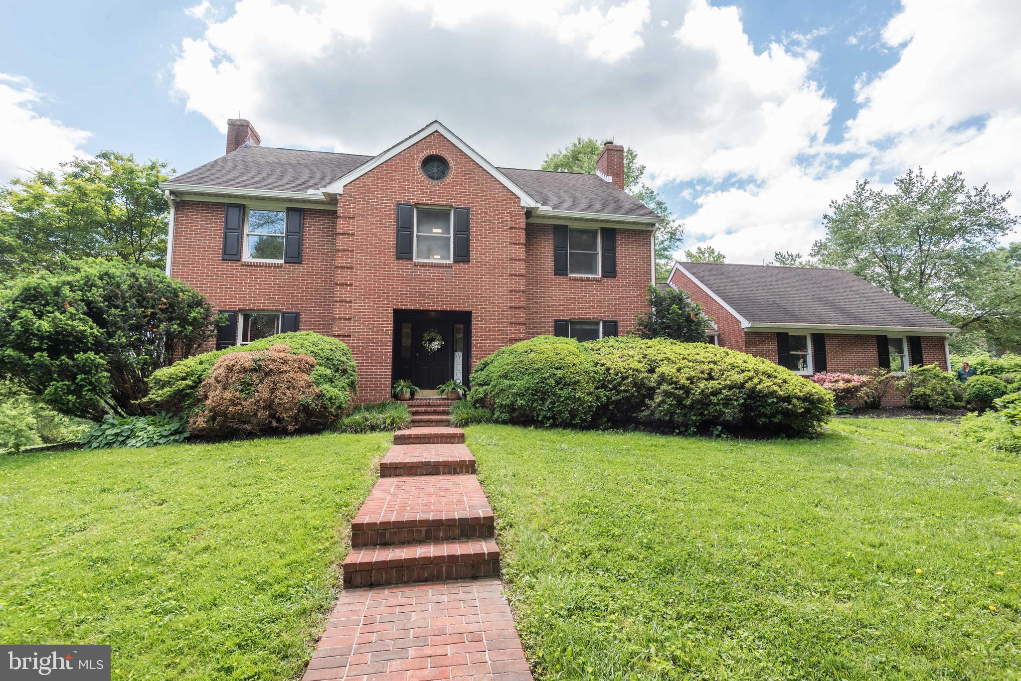 16120 Barnesville Road Boyds, MD 20841 - Photo 2 of 128 a front view of a house with yard and green space