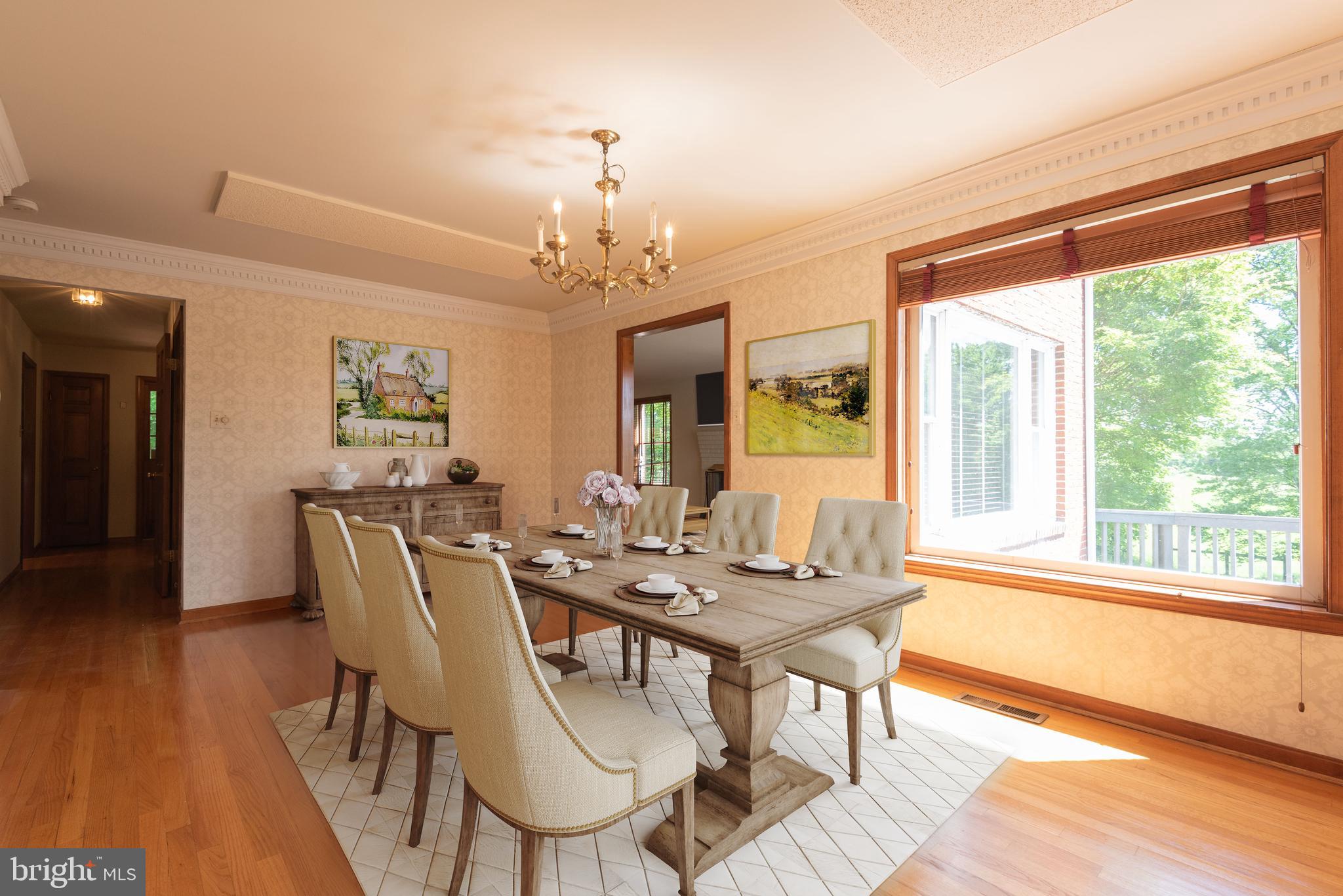 16120 Barnesville Road Boyds, MD 20841 - Photo 27 of 128 a view of a dining room with furniture window and wooden floor