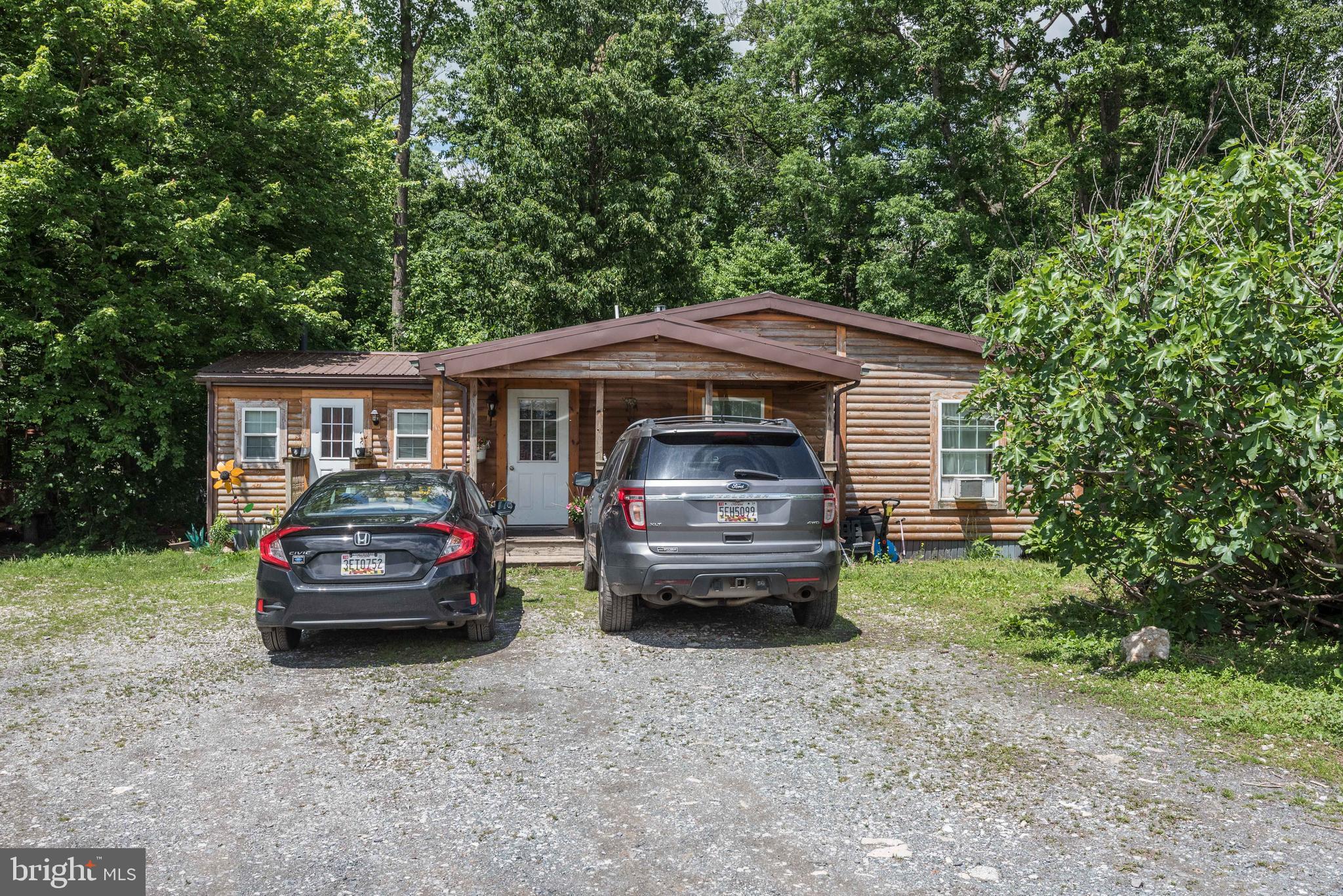 16120 Barnesville Road Boyds, MD 20841 - Photo 82 of 128 a front view of a house with a garden
