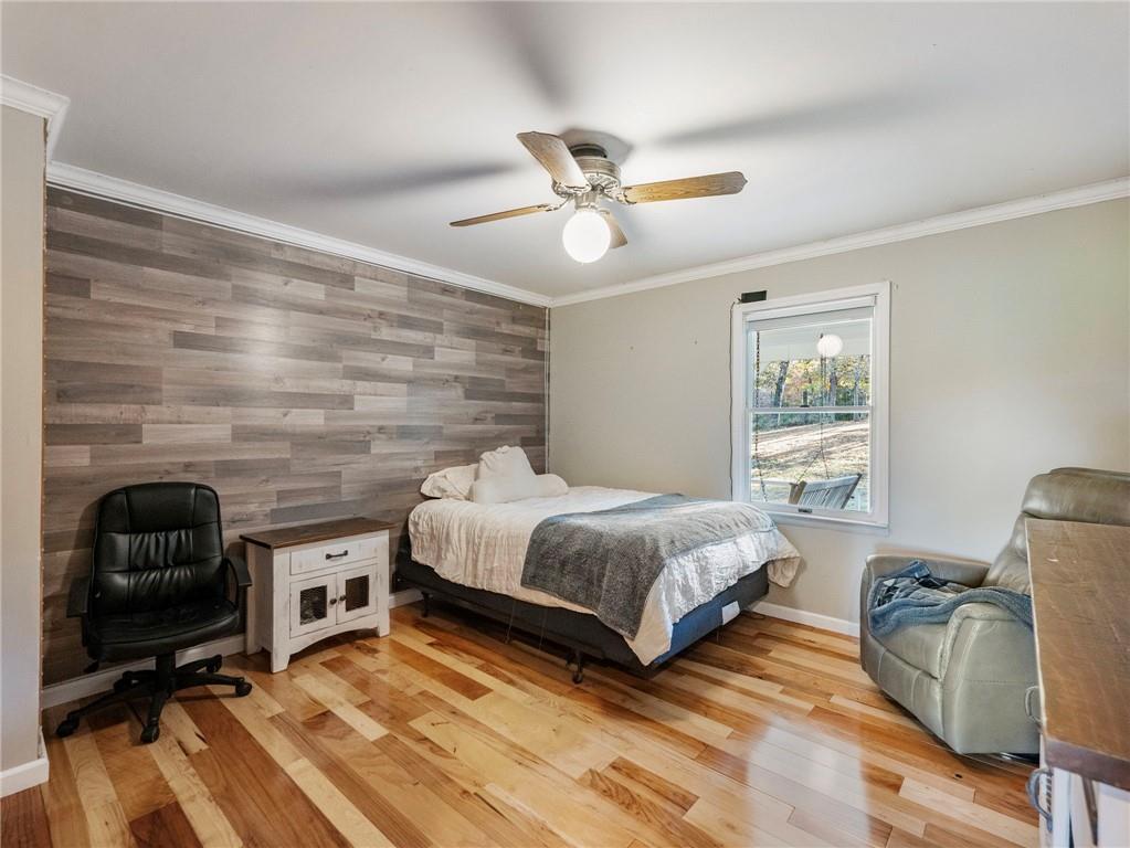 849 Blacksnake Road Mount Airy, GA 30563 - Photo 13 of 68 a bedroom with bed and a window