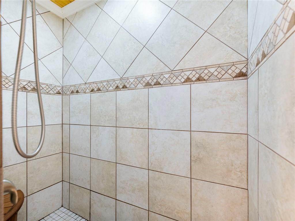 849 Blacksnake Road Mount Airy, GA 30563 - Photo 20 of 68 a bathroom with a shower