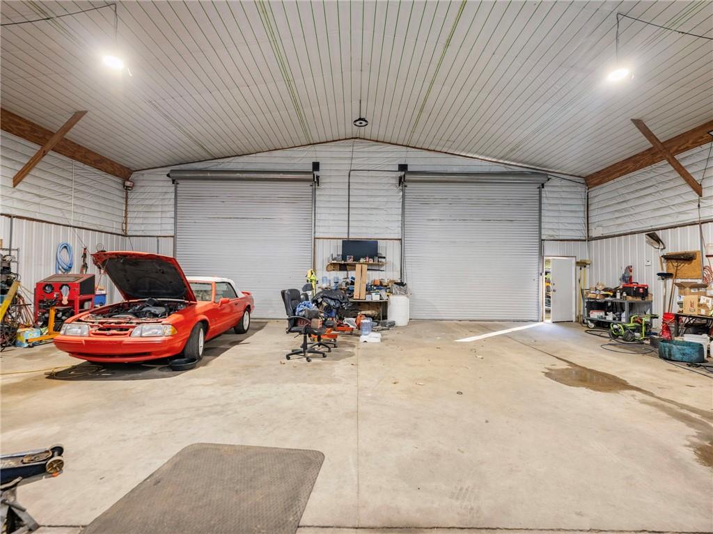 849 Blacksnake Road Mount Airy, GA 30563 - Photo 65 of 68 a view of a garage with parked cars