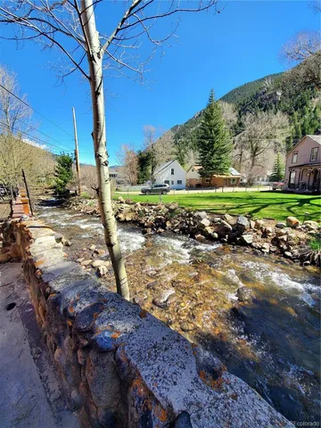 a view of a yard with an outdoor space