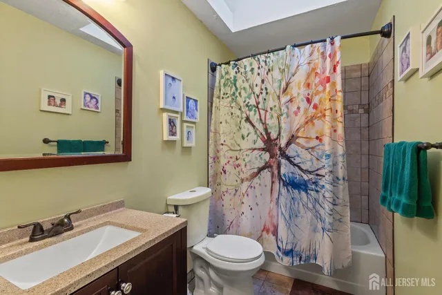 a view of a room with furniture and window