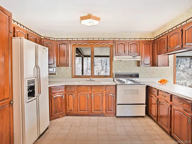 a view of a large body of water with a building in the background