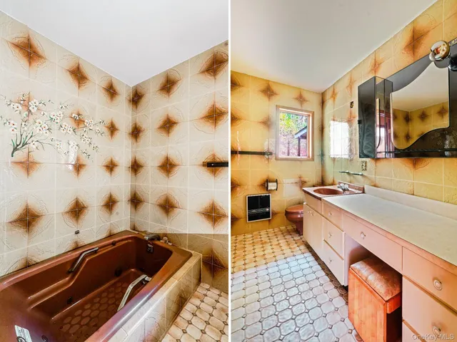 a view of a white house with a big yard plants and large trees