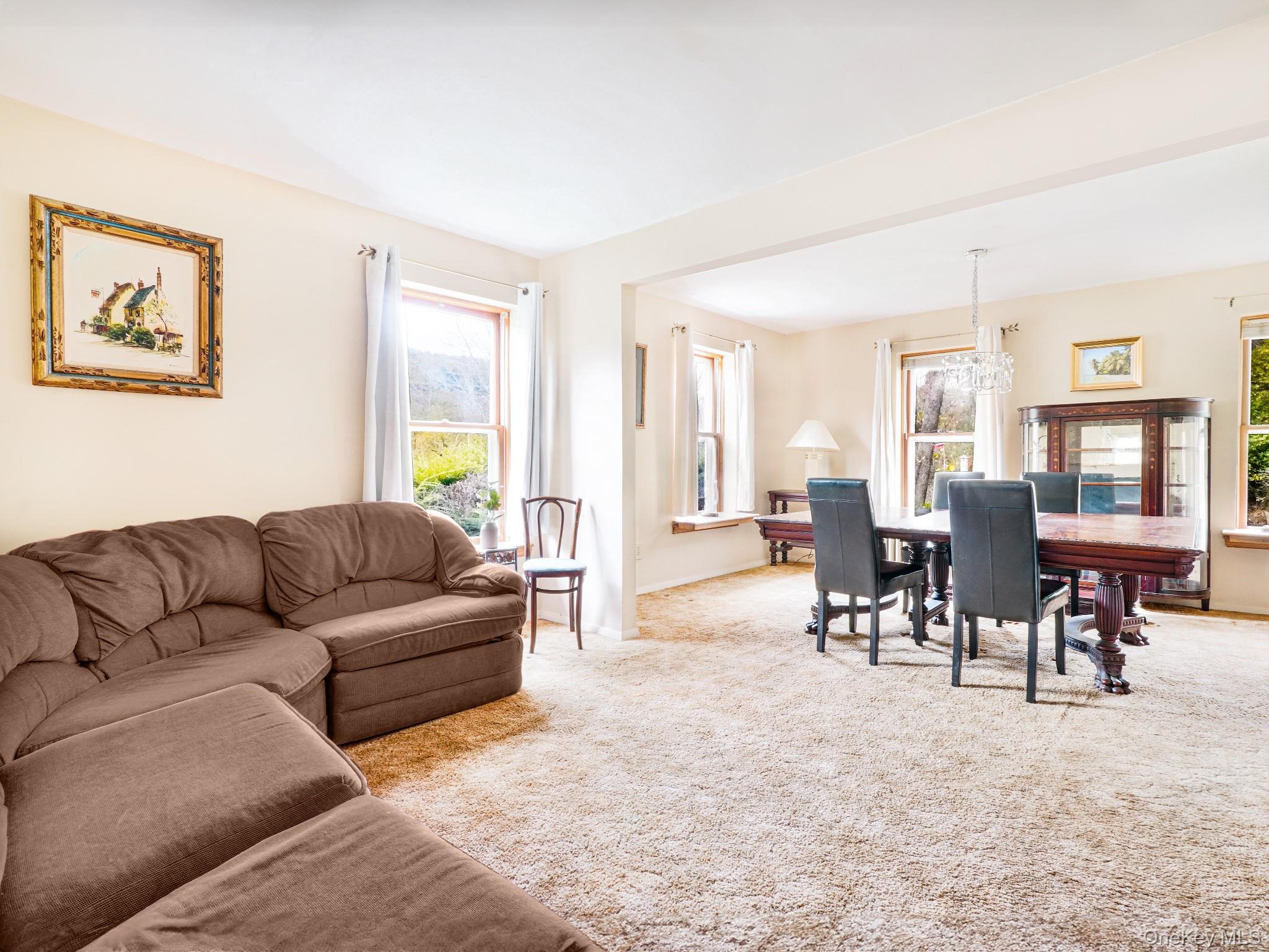 2182 Old Rte 17 Roscoe, NY 12776 - Photo 3 of 37 a living room with furniture dining area and a window