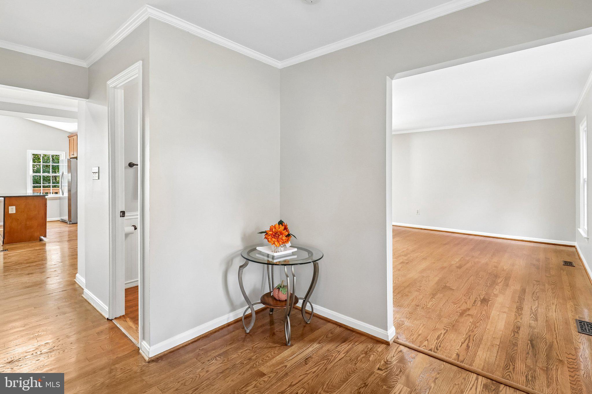 12408 Triple Crown Road Gaithersburg, MD 20878 - Photo 7 of 87 Foyer that opens to the family and living rooms.