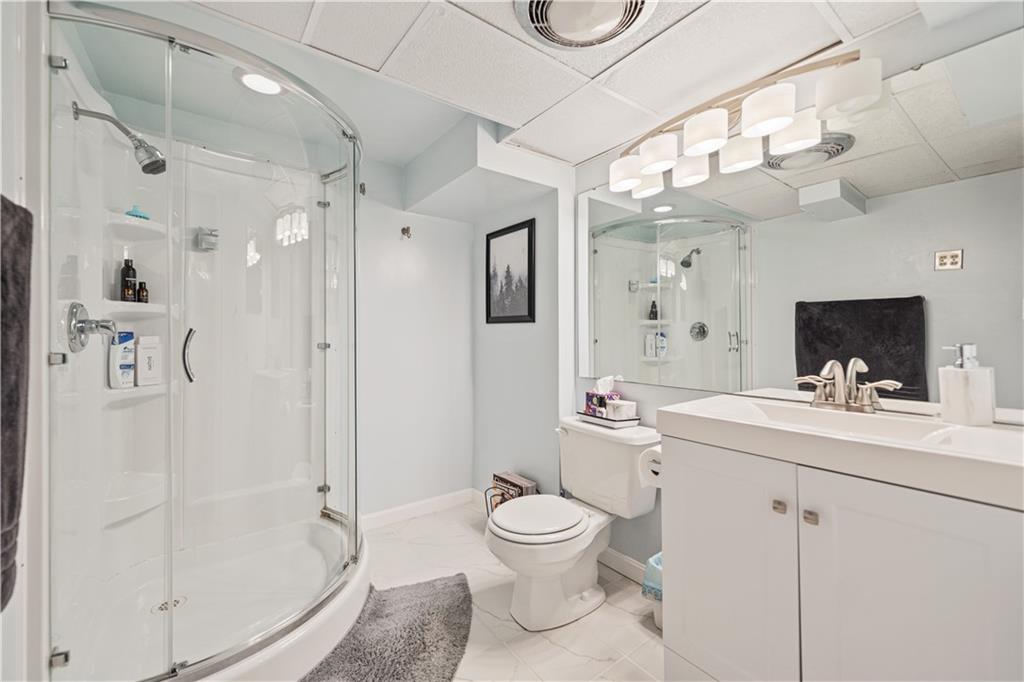 115 Maruth Drive Pittsburgh, PA 15237 - Photo 19 of 30 a bathroom with a sink a toilet and shower