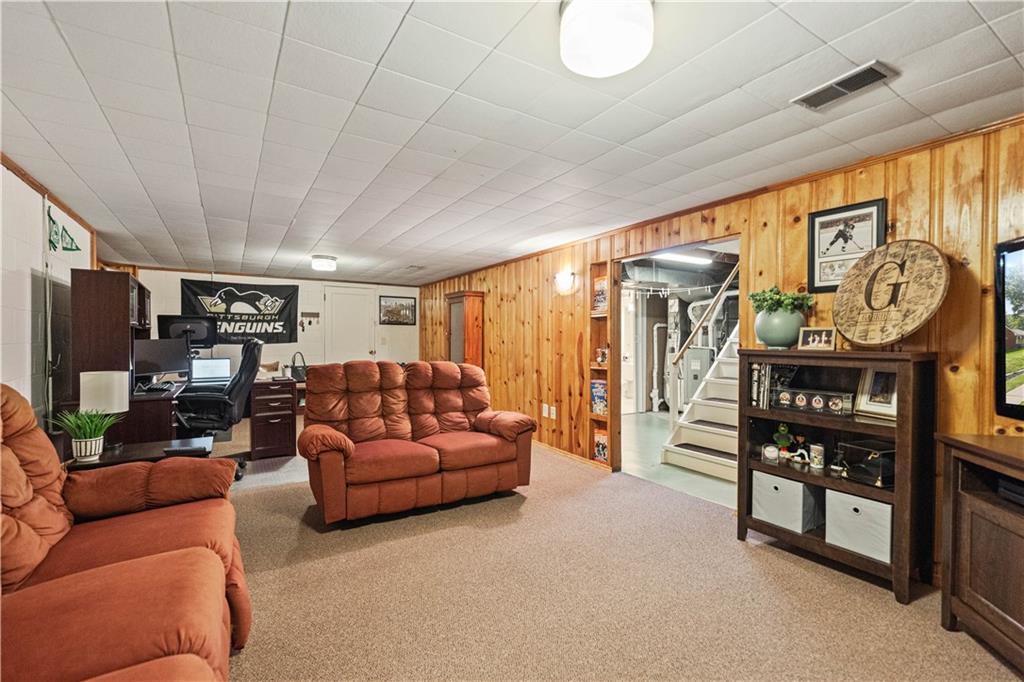 115 Maruth Drive Pittsburgh, PA 15237 - Photo 21 of 30 a living room with furniture a ceiling fan and a large window