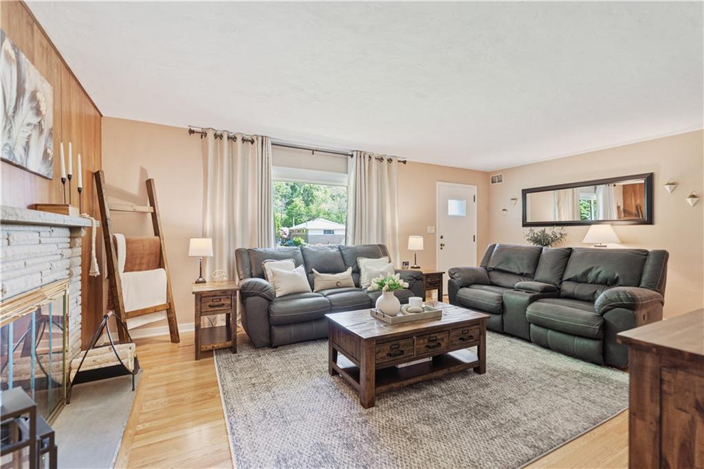 115 Maruth Drive Pittsburgh, PA 15237 - Photo 3 of 30 a living room with furniture and a fireplace