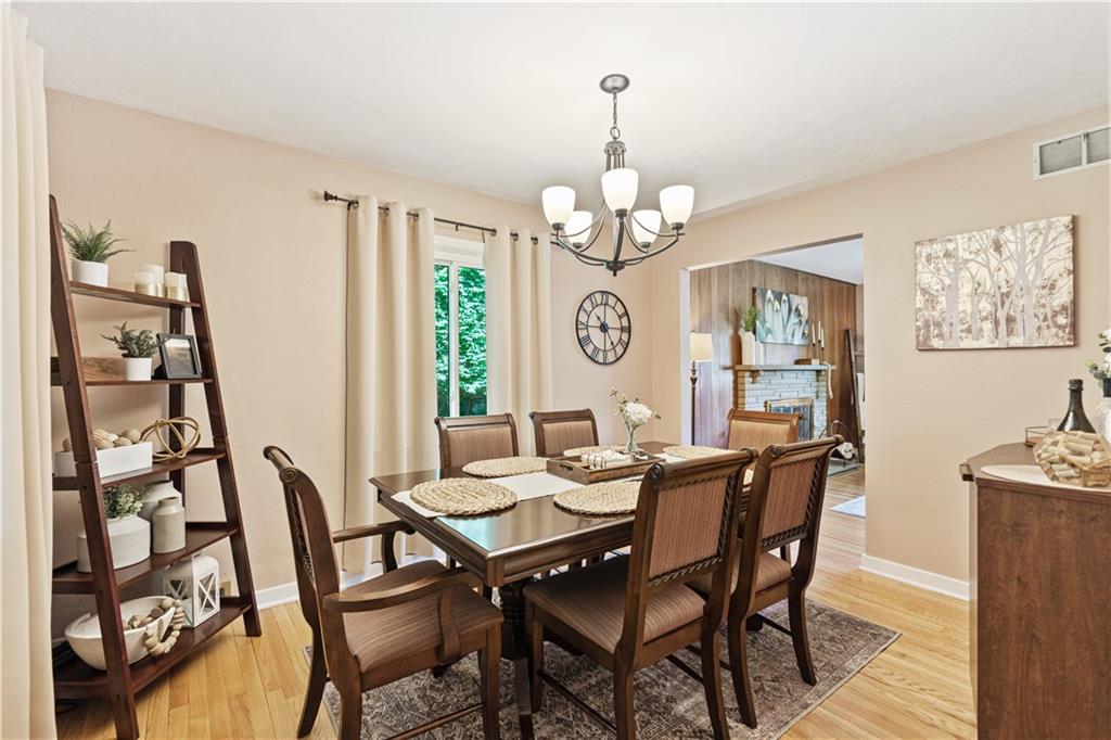 115 Maruth Drive Pittsburgh, PA 15237 - Photo 7 of 30 a view of a dining room with furniture wooden floor and chandelier