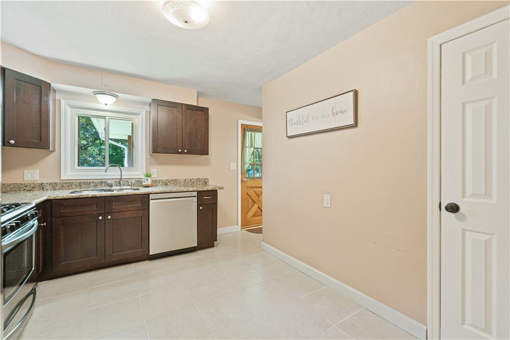 115 Maruth Drive Pittsburgh, PA 15237 - Photo 10 of 30 a kitchen with stainless steel appliances granite countertop a stove a sink and a refrigerator