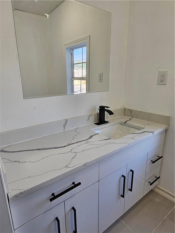 536 Virginia Avenue Rochester, PA 15074 - Photo 12 of 24 a bathroom with a sink and a mirror