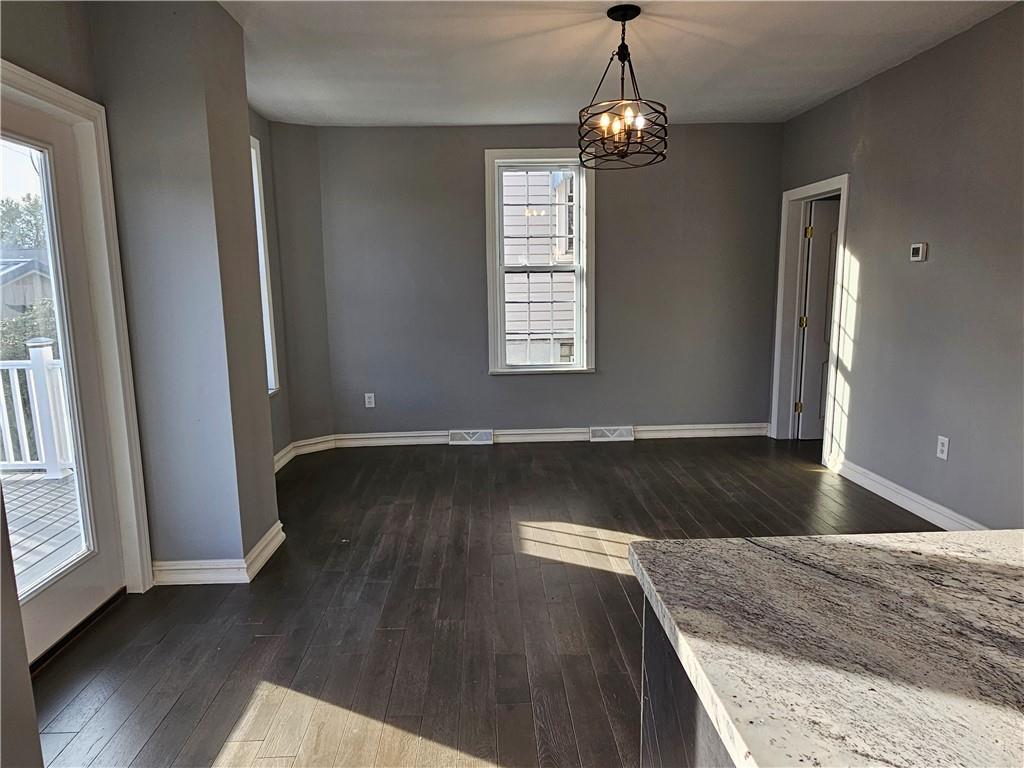 536 Virginia Avenue Rochester, PA 15074 - Photo 13 of 24 wooden floor in an empty room with a window