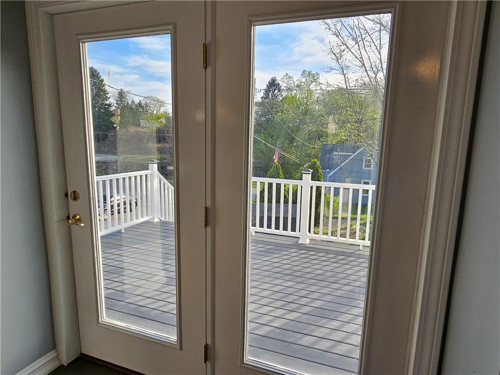 536 Virginia Avenue Rochester, PA 15074 - Photo 14 of 24 a view of a wooden house with a window
