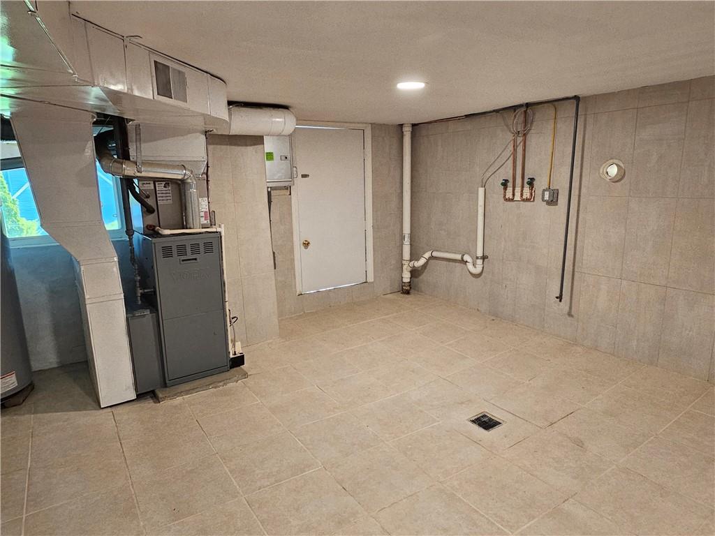 536 Virginia Avenue Rochester, PA 15074 - Photo 19 of 24 a view of a storage & utility room with refrigerator