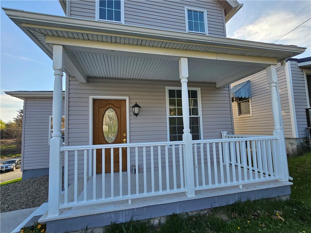 536 Virginia Avenue Rochester, PA 15074 - Photo 2 of 24 a view of a house with wooden fence