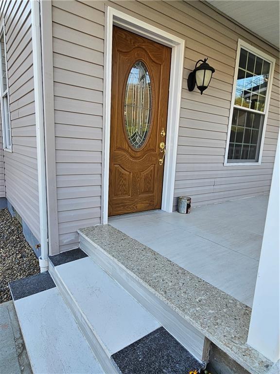 536 Virginia Avenue Rochester, PA 15074 - Photo 4 of 24 a front view of a house with a garage
