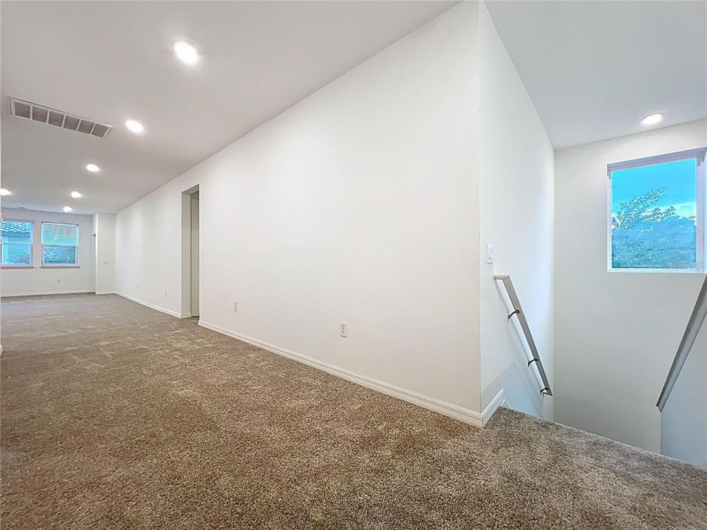 12821 Westside Vlg Loop Windermere, FL 34786 - Photo 23 of 42 a view of an empty room