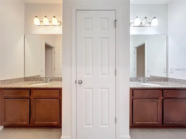 a white toilet sitting next to a bath tub