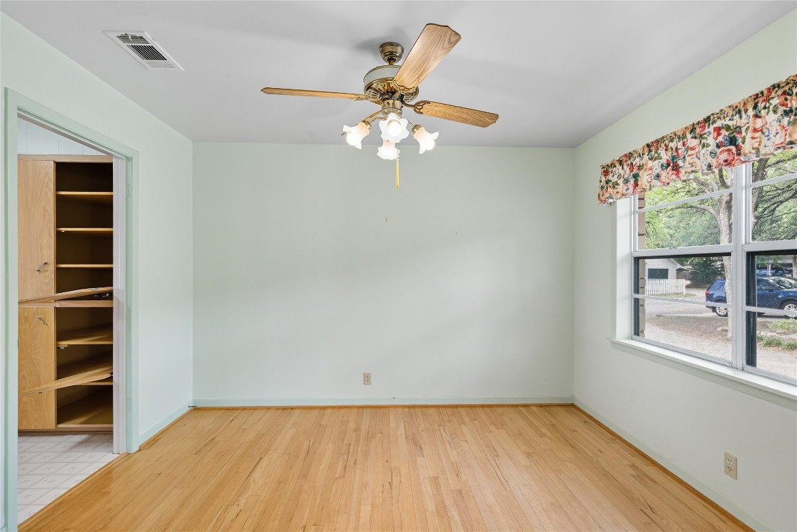 508 Morris Drive Georgetown, TX 78628 - Photo 26 of 40 wooden floor in an empty room with a window