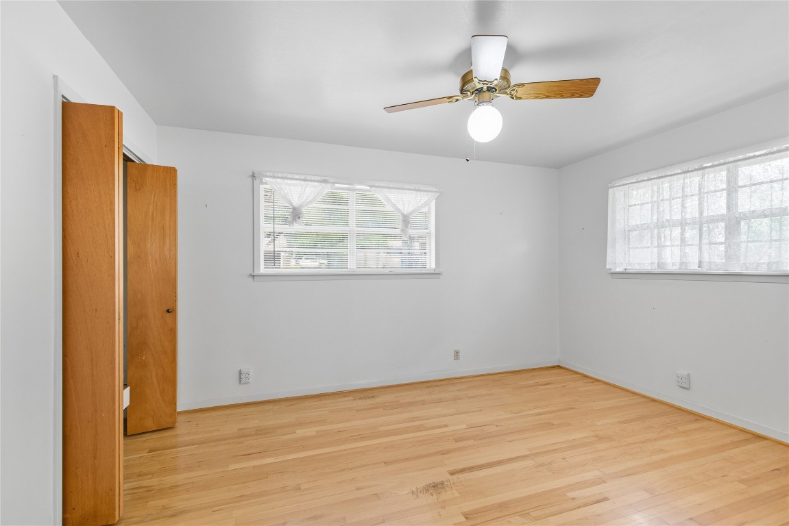 508 Morris Drive Georgetown, TX 78628 - Photo 32 of 40 a view of empty room with wooden floor and fan