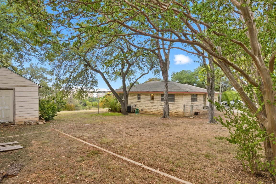 508 Morris Drive Georgetown, TX 78628 - Photo 37 of 40 a house with a tree in front of it