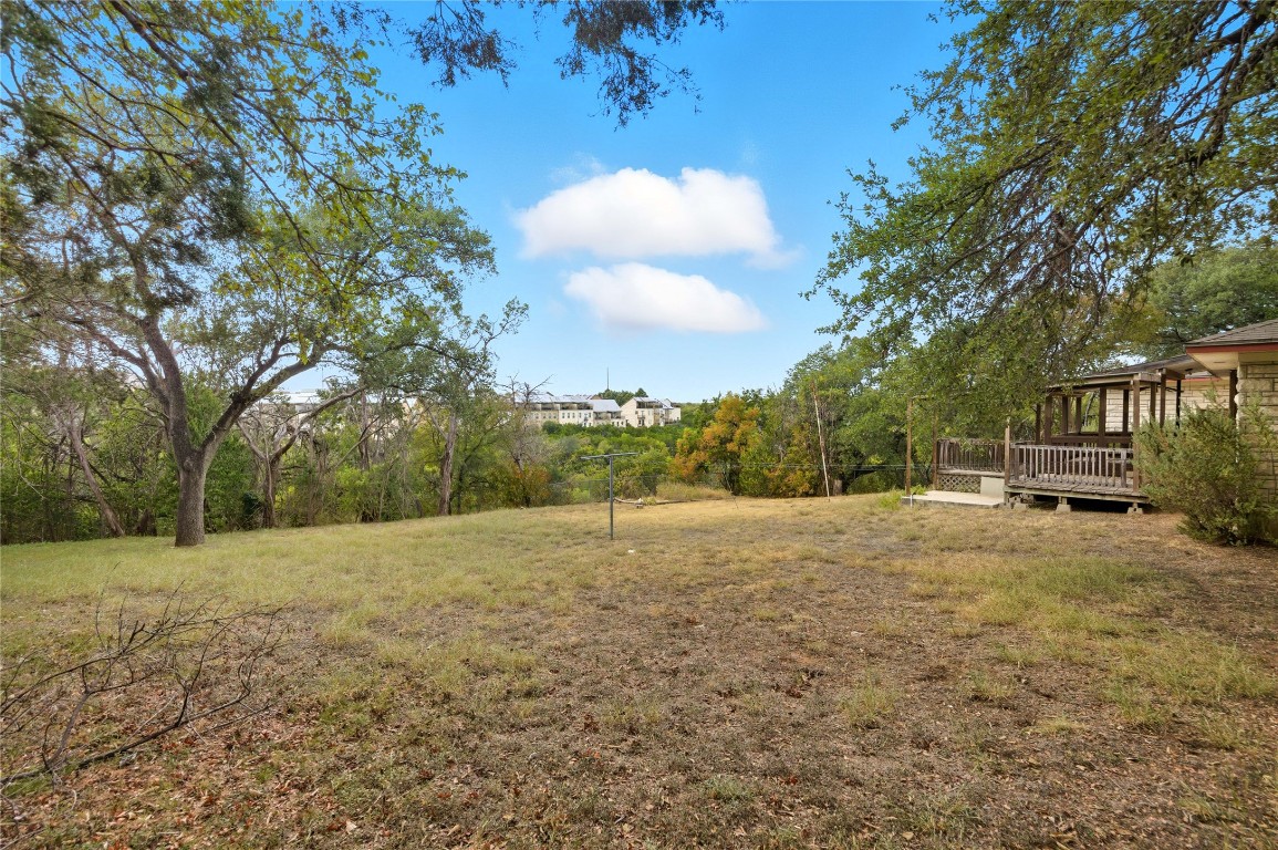 508 Morris Drive Georgetown, TX 78628 - Photo 7 of 40 View of green lawn with a deck