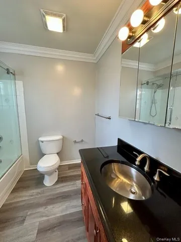 a bathroom with a sink and a toilet