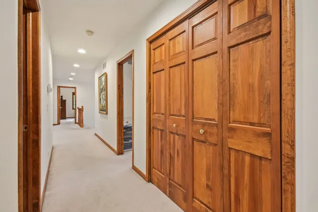 a backyard of a house with large trees