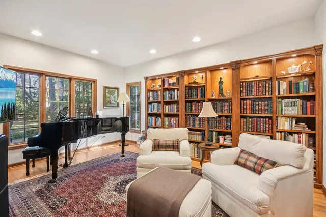 a kitchen with a stove a refrigerator and wooden cabinets