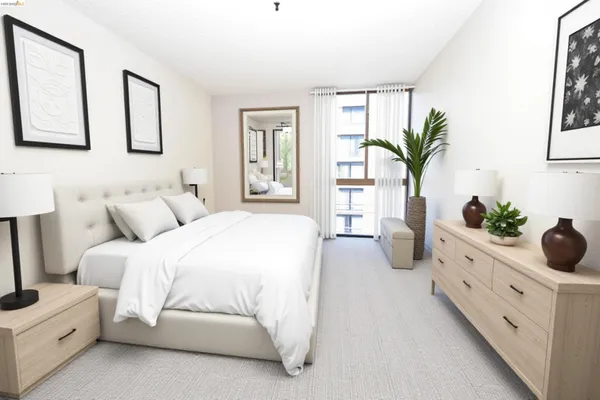 a spacious bedroom with a bed and a potted plant