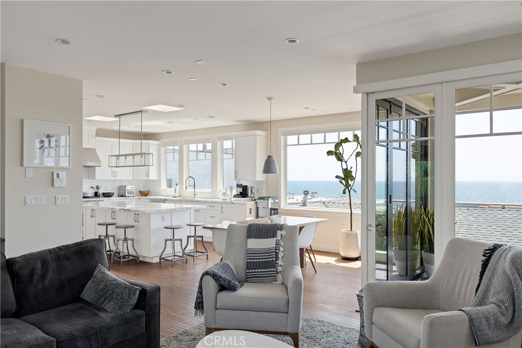 124 23rd Street Manhattan Beach, CA 90266 - Photo 11 of 50 a living room with furniture and a large window