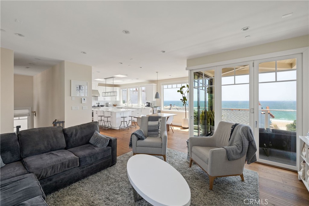 124 23rd Street Manhattan Beach, CA 90266 - Photo 23 of 50 a living room with furniture and a large window