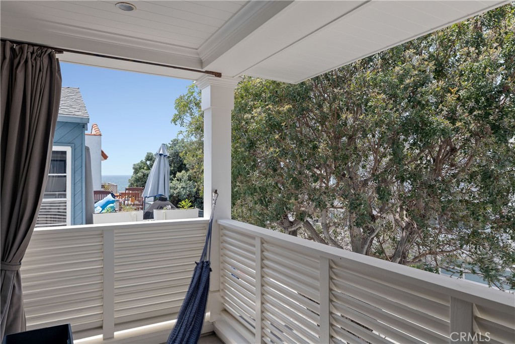 124 23rd Street Manhattan Beach, CA 90266 - Photo 39 of 50 a view of a balcony with floor to ceiling window with wooden floor