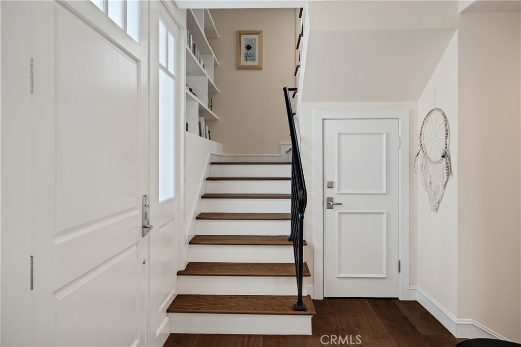124 23rd Street Manhattan Beach, CA 90266 - Photo 43 of 50 a view of entryway with wooden floor and staircase