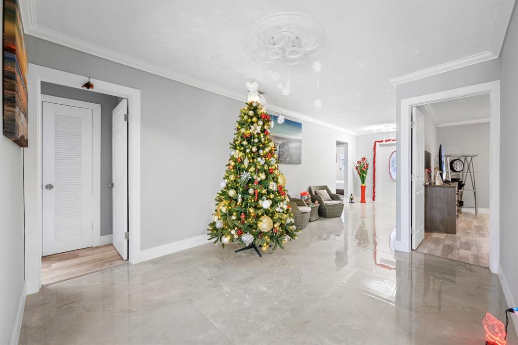 1336 Funston Street Hollywood, FL 33019 - Photo 13 of 51 a room with lots of flowers and garden