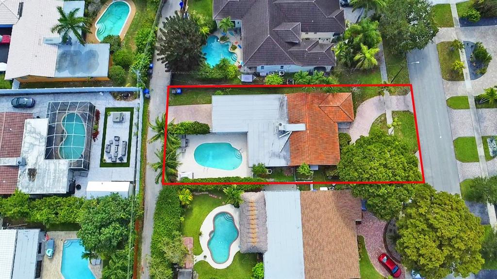 1336 Funston Street Hollywood, FL 33019 - Photo 2 of 51 an aerial view of a house with yard swimming pool and outdoor seating