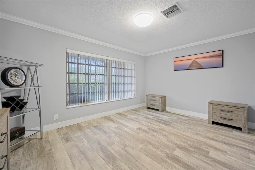 1336 Funston Street Hollywood, FL 33019 - Photo 33 of 51 wooden floor and windows in a room