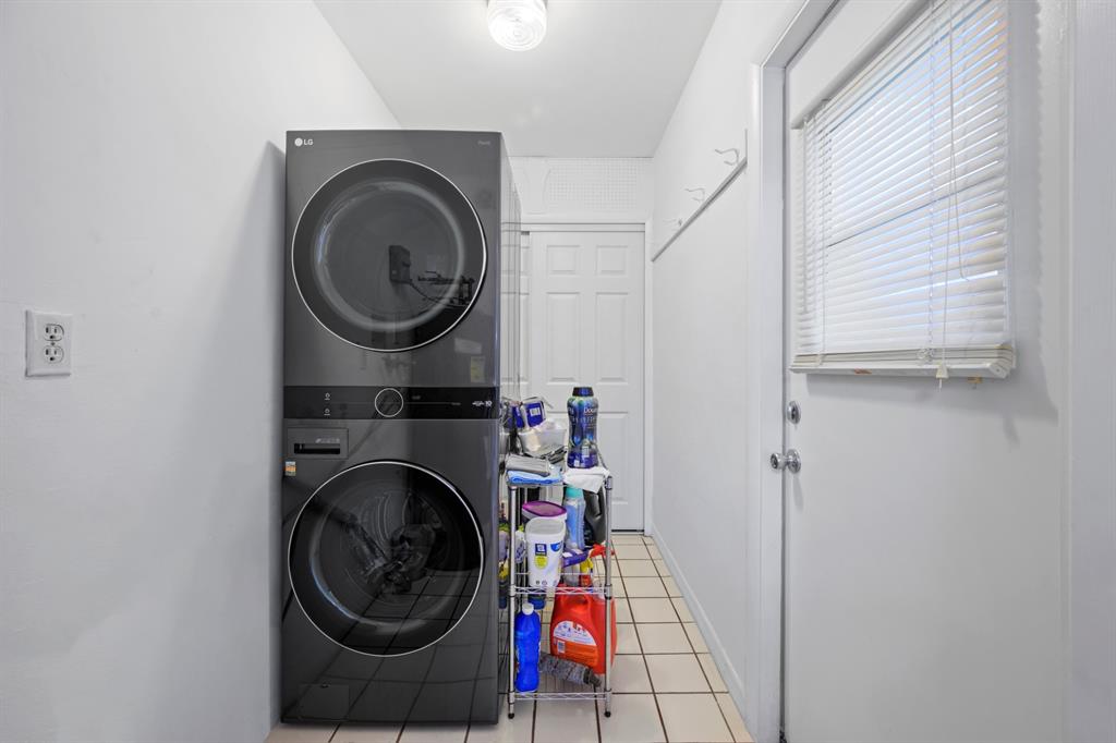 1336 Funston Street Hollywood, FL 33019 - Photo 34 of 51 a view of a storage and utility room with washer and dryer