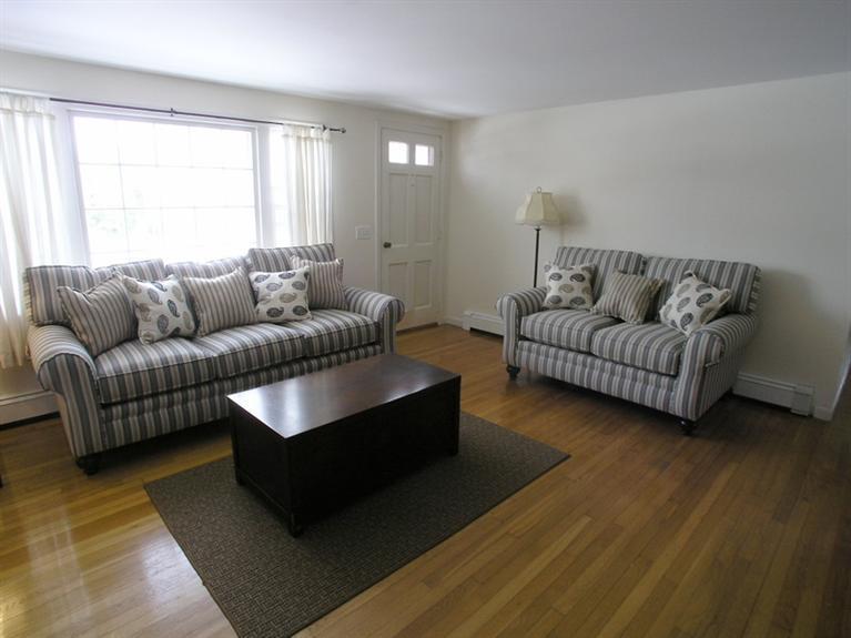 14 Knox Road Dennis Port, MA 02639 - Photo 6 of 14 a living room with furniture and a large window